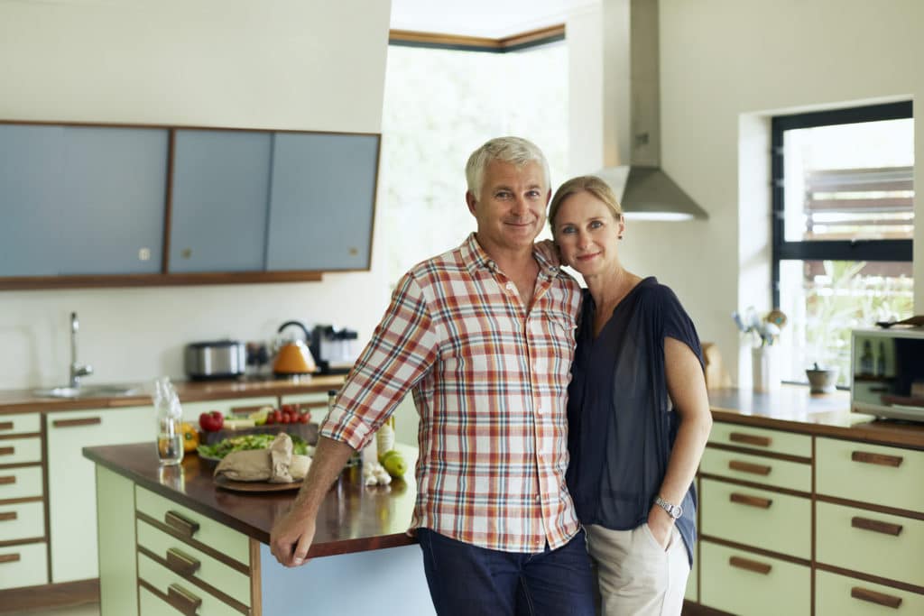 couple standing in kitchen